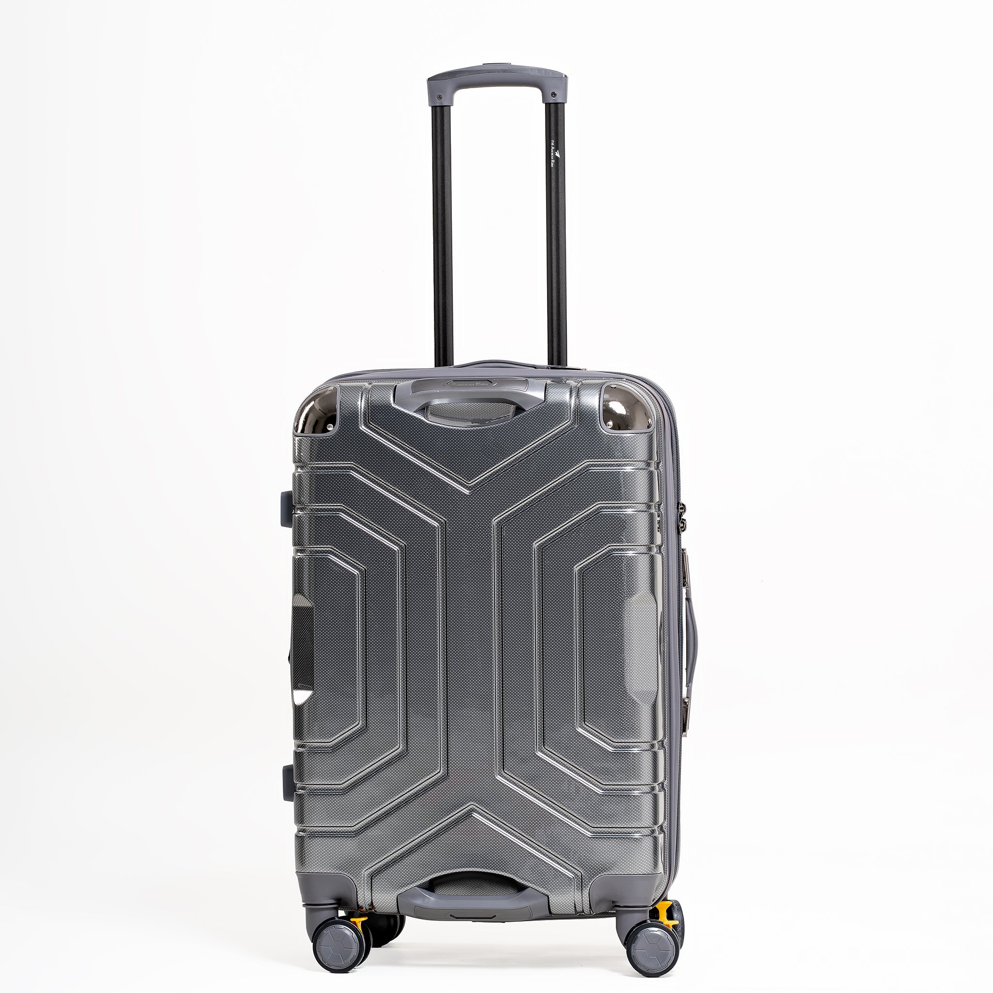 Silver suitcase with geometric design on a white background