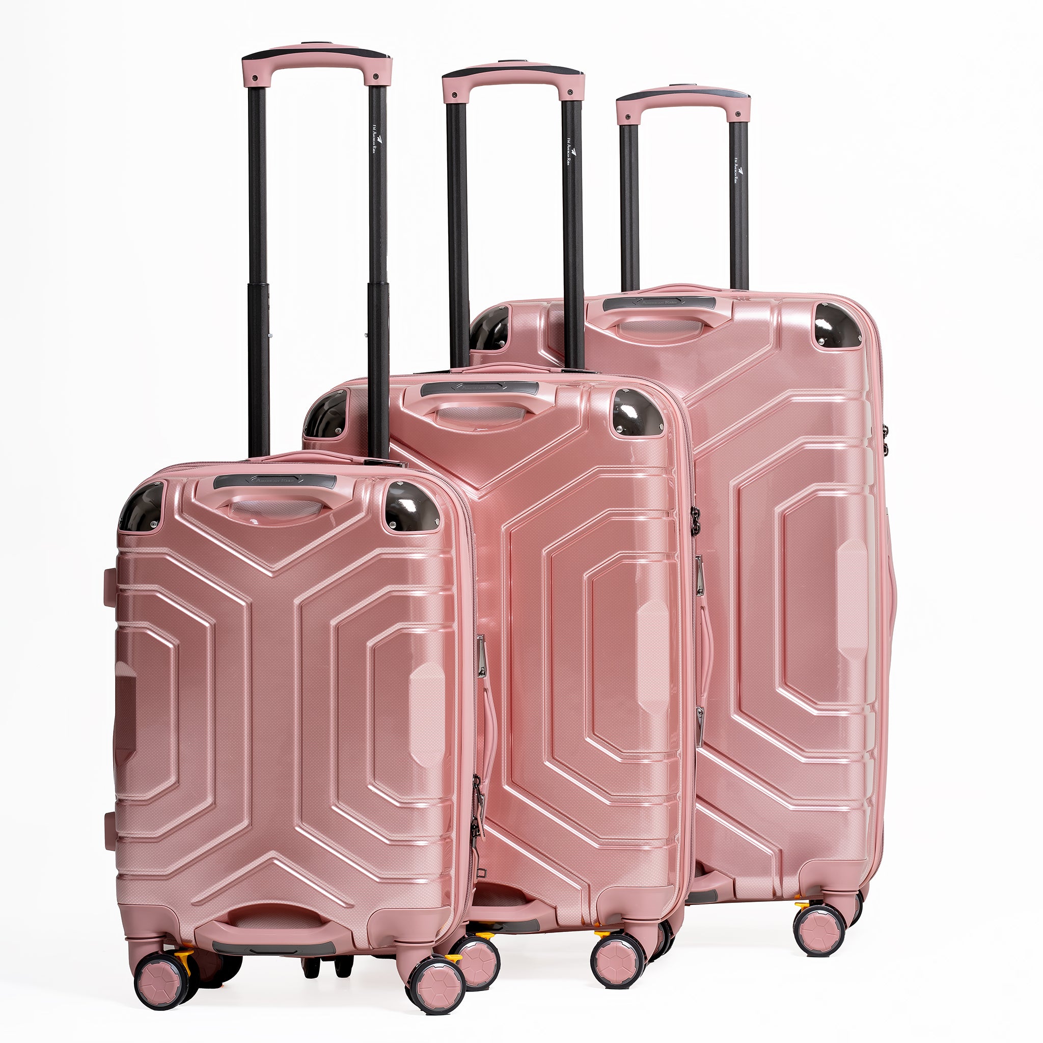 Set of three rose gold suitcases with geometric patterns on a white background