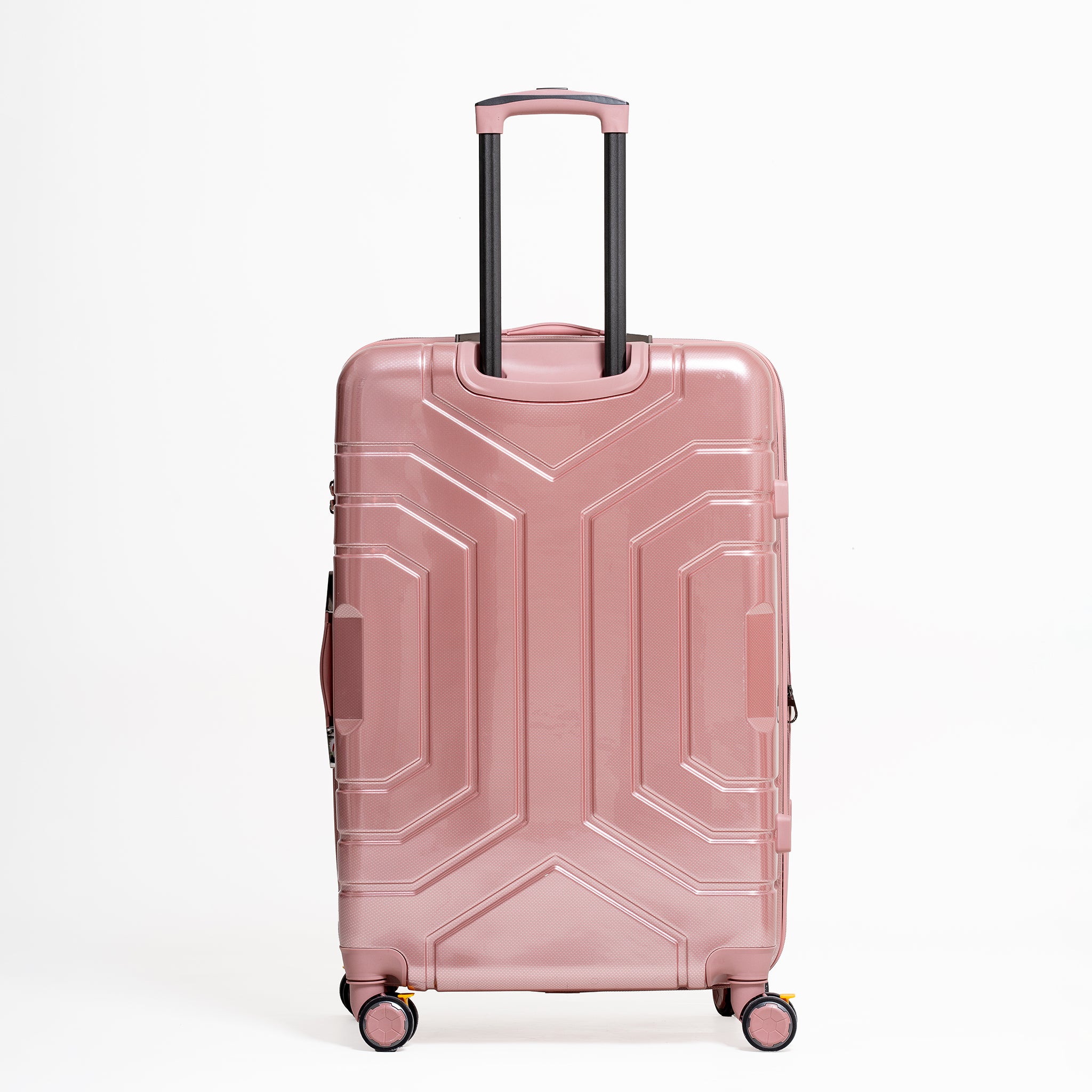 Pink suitcase with geometric design on a white background