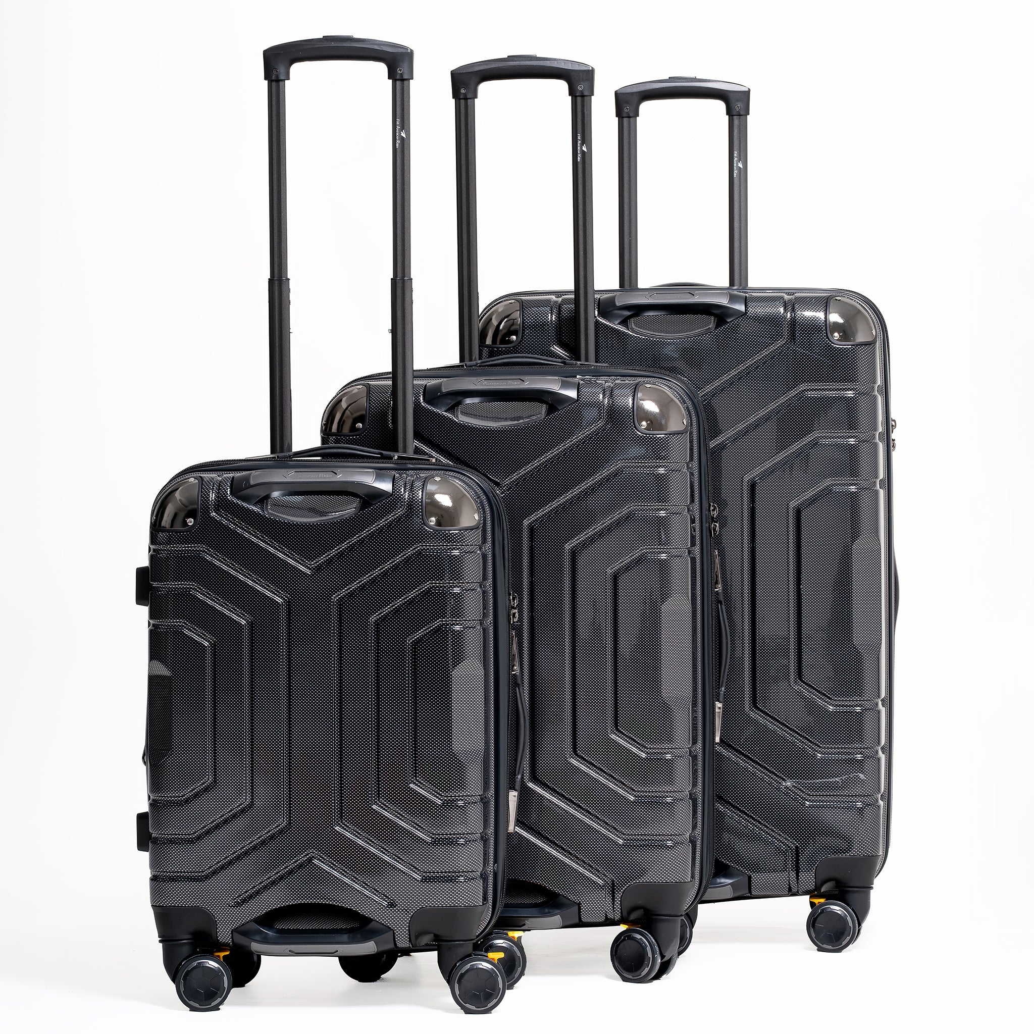 Three black suitcases of different sizes on a white background