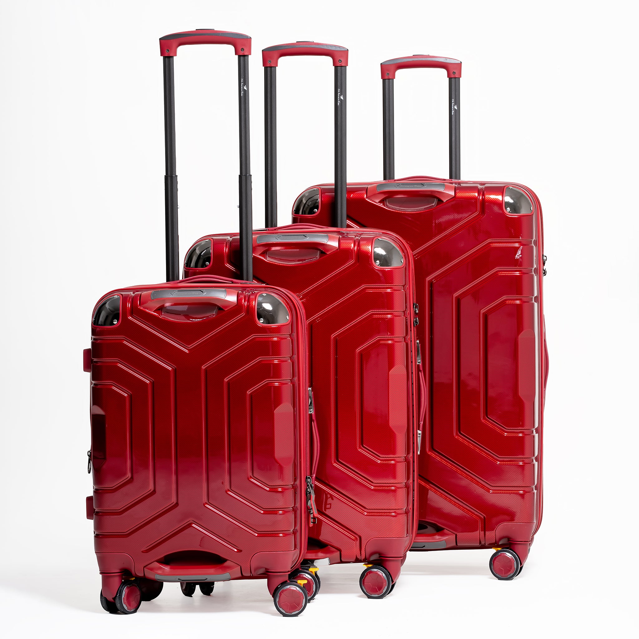 Three red suitcases of different sizes on a white background