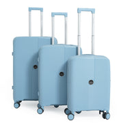 Set of three light blue suitcases with wheels on a white background