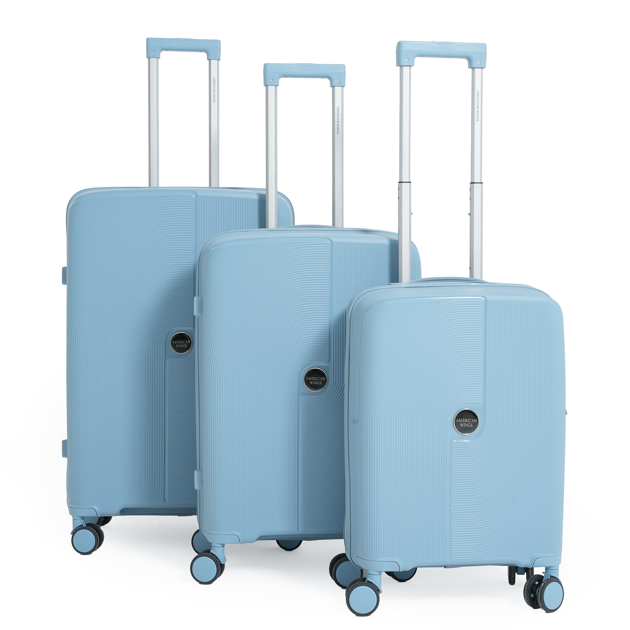 Set of three light blue suitcases with wheels on a white background