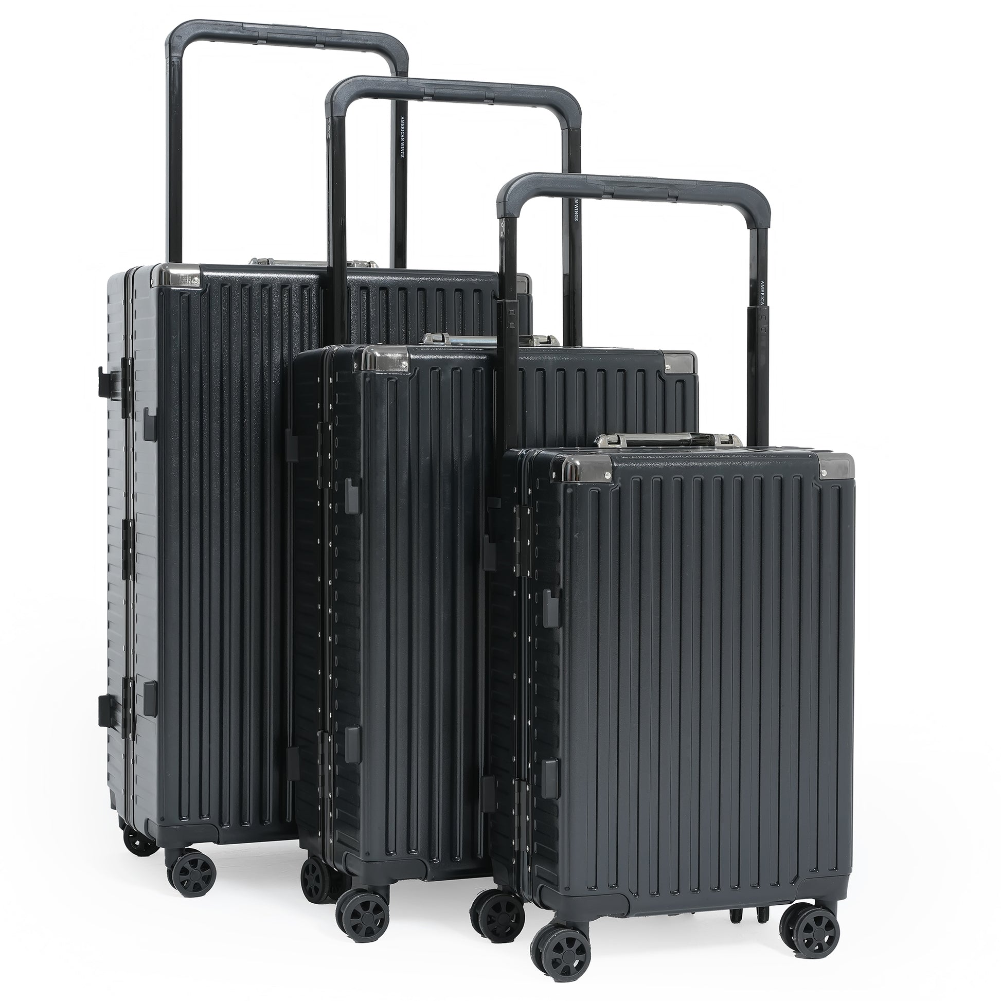 Set of three black suitcases of different sizes on a white background