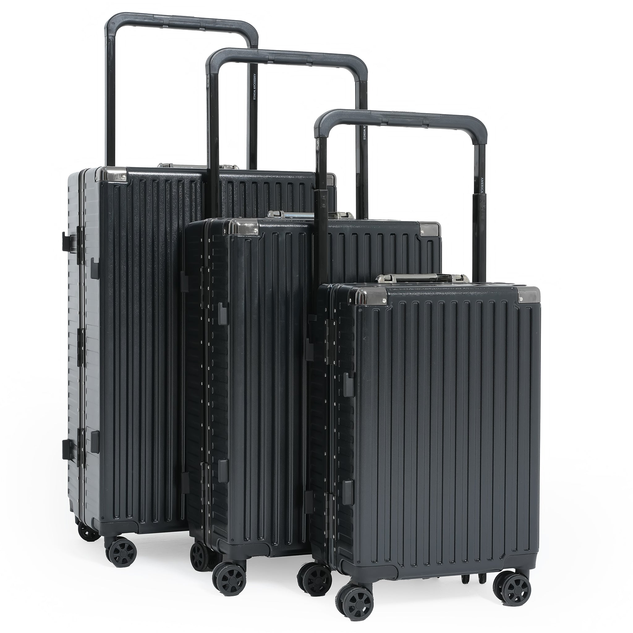 Set of three black suitcases of different sizes on a white background