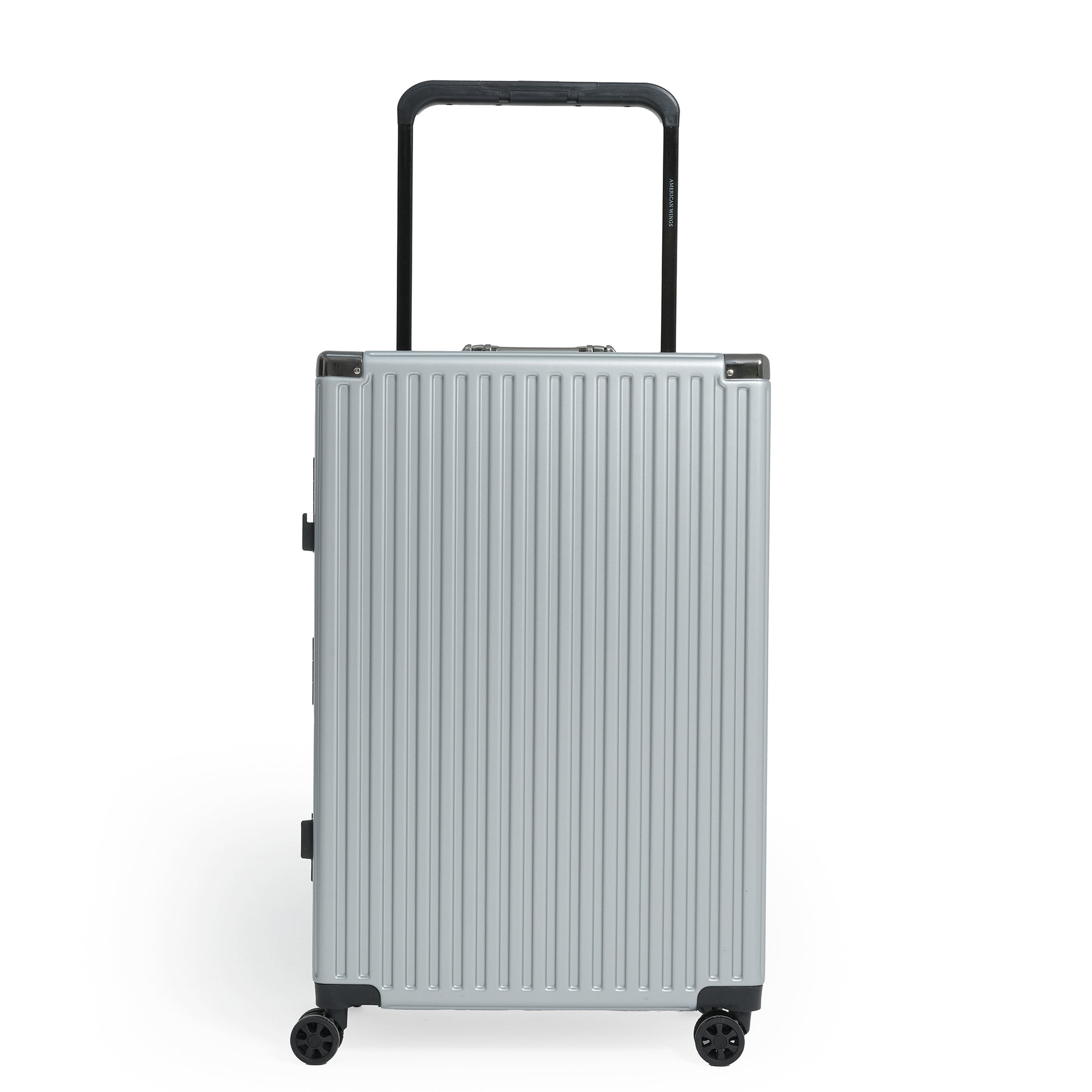 Silver suitcase with black handle and wheels on a white background