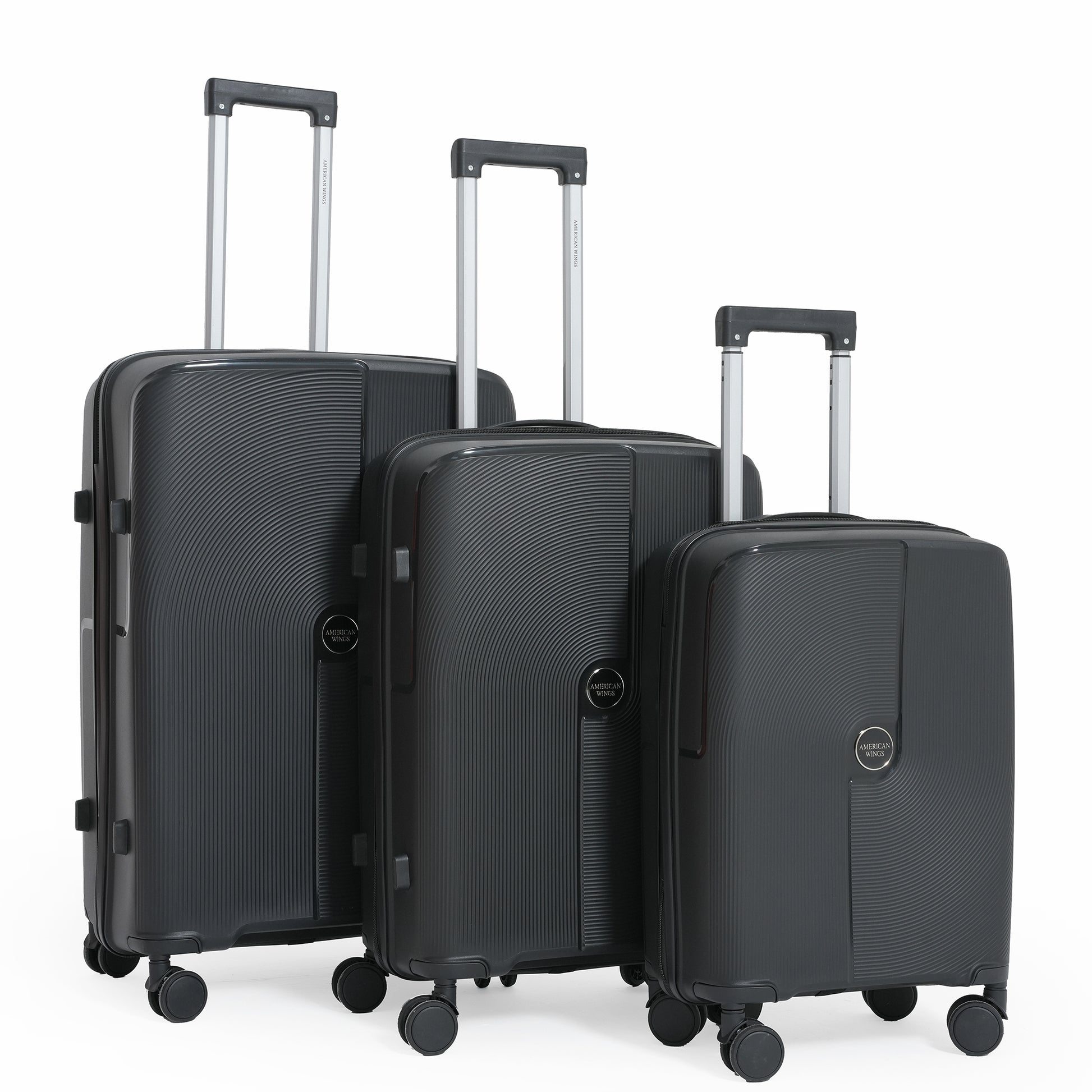 Three black suitcases of different sizes on a white background