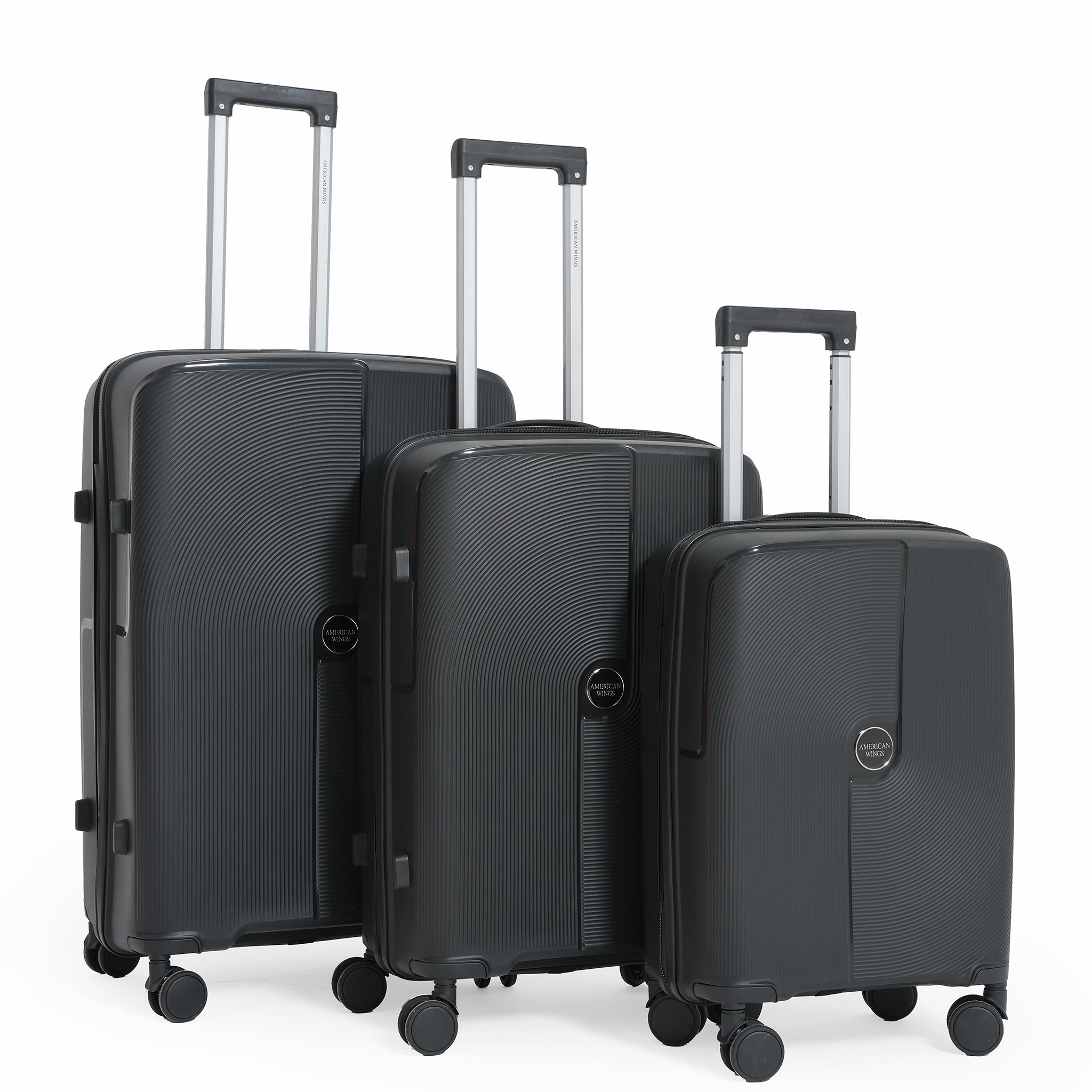 Three black suitcases of different sizes on a white background