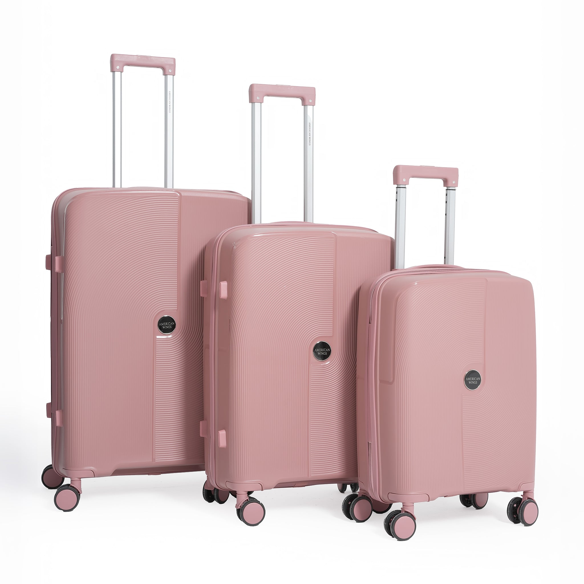 Set of three pink suitcases with wheels on a white background