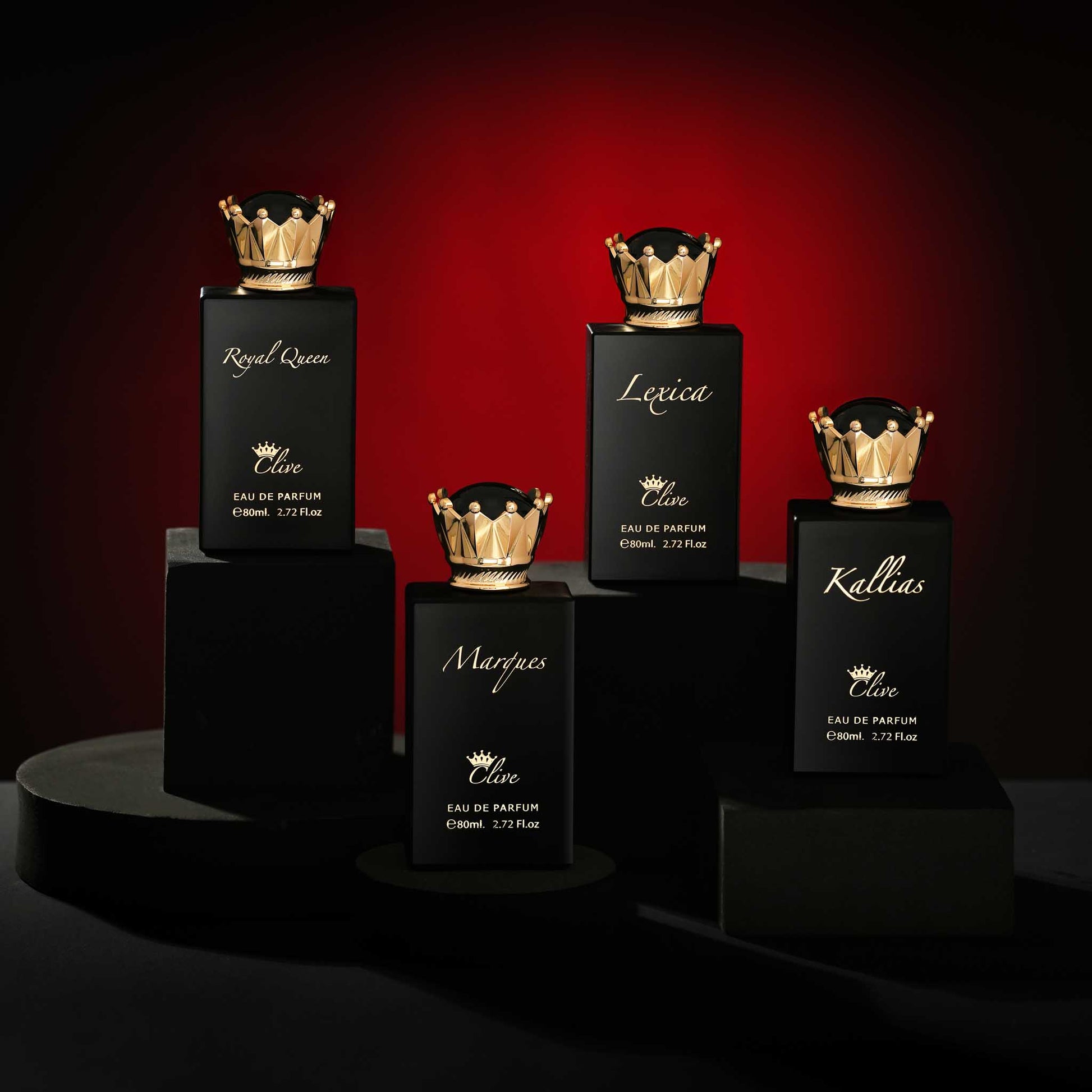 Five black perfume bottles with gold crowns on a red background