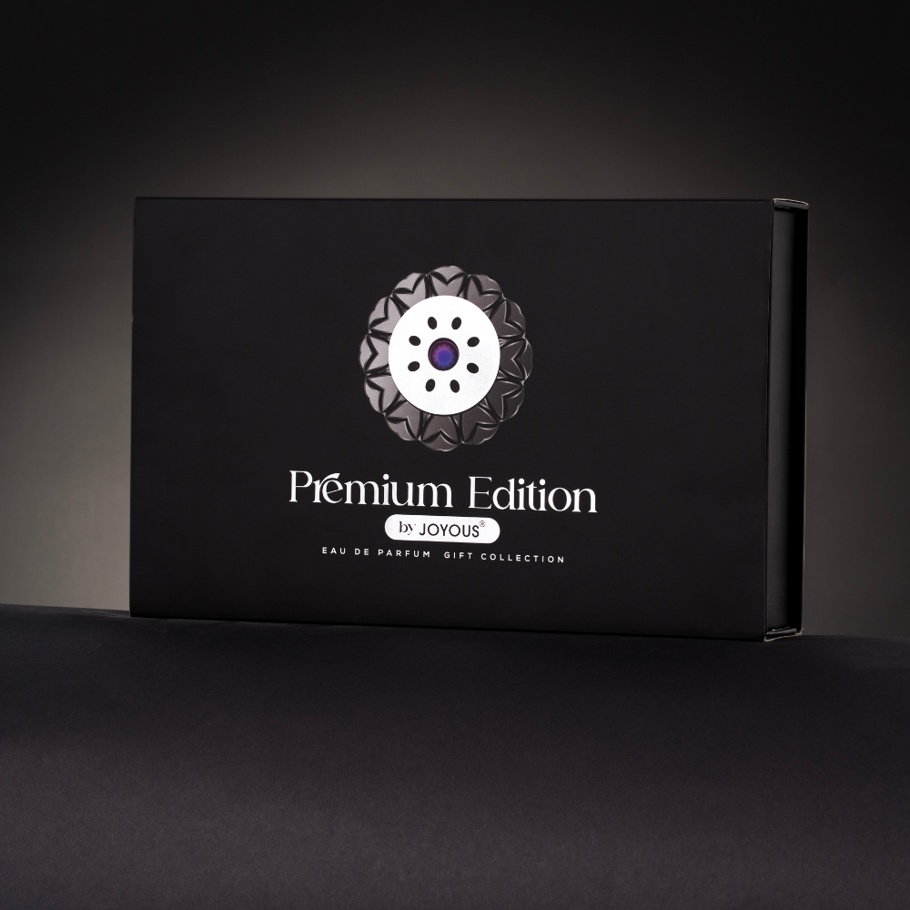 Black gift box with a decorative logo and 'Premium Edition' text on a dark background