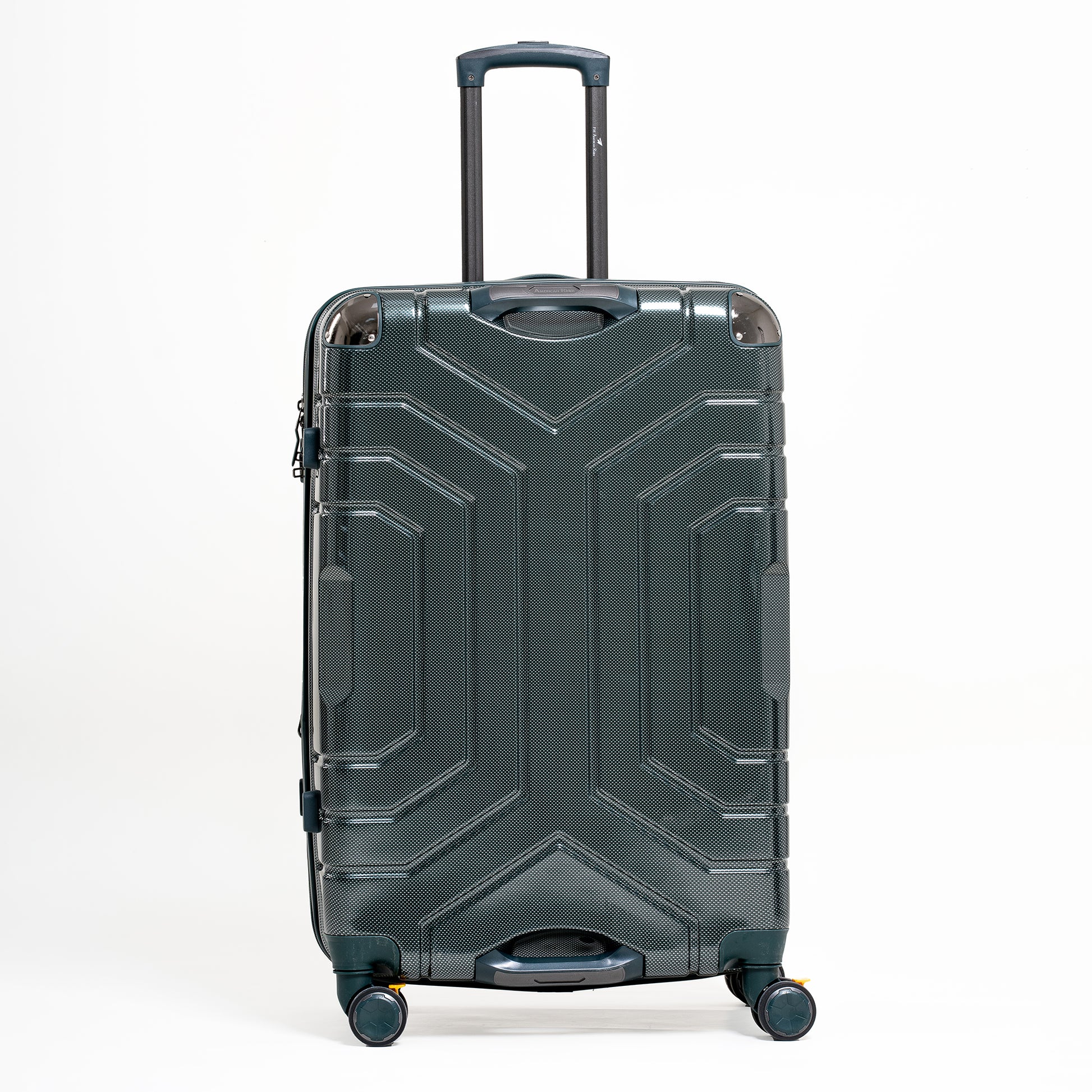 Green suitcase with geometric design on a white background