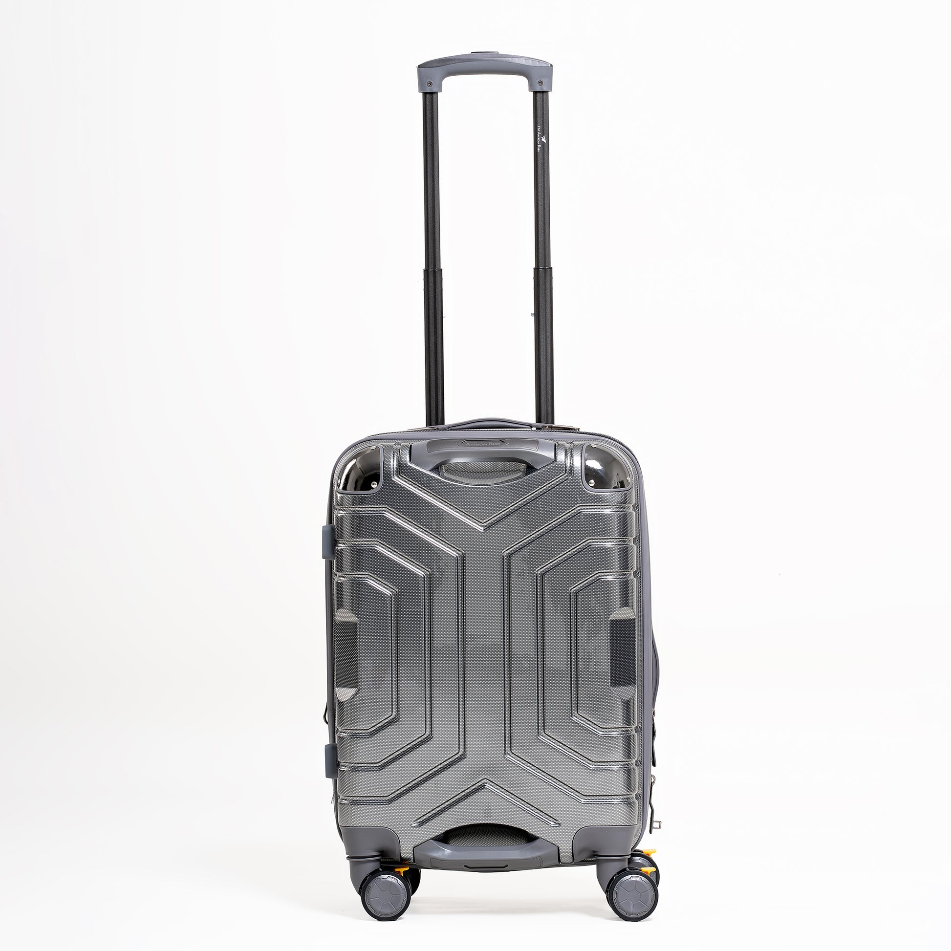 Silver suitcase with geometric design on a white background