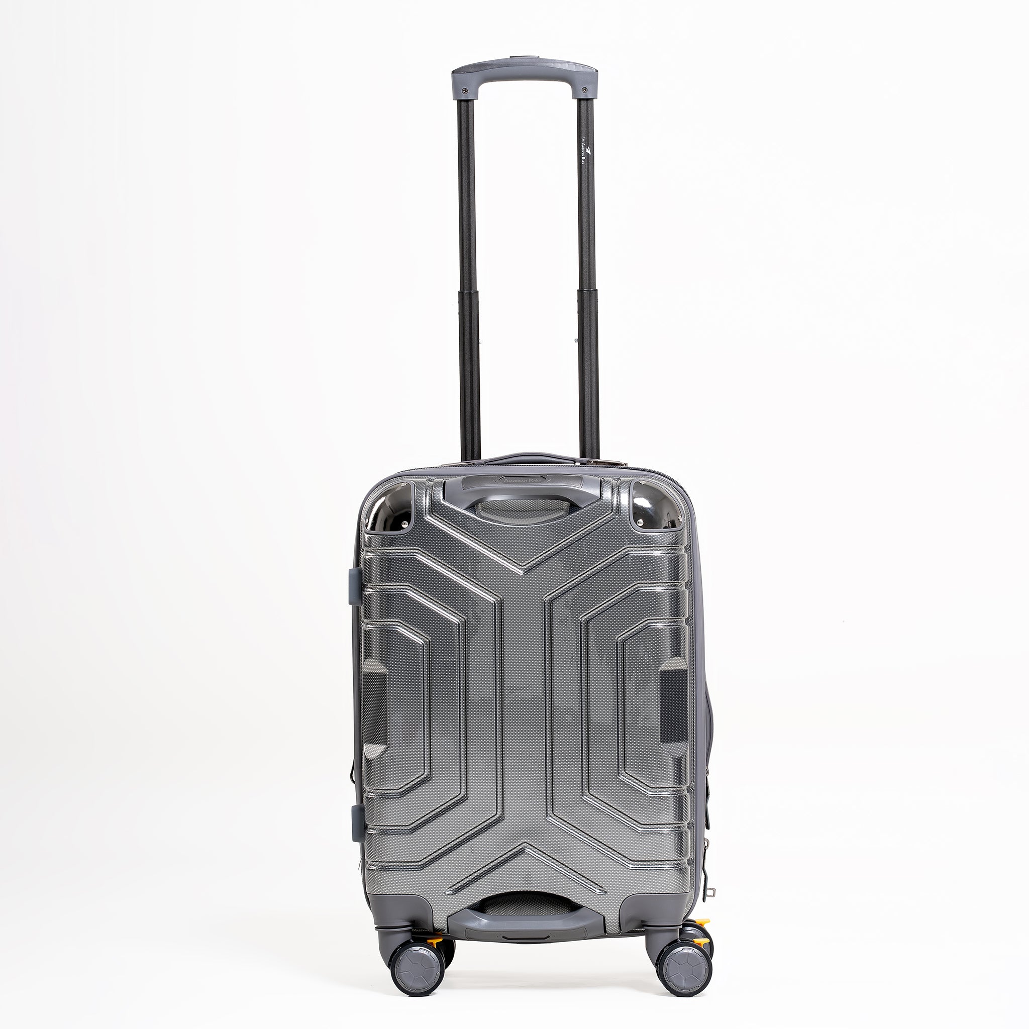 Silver suitcase with geometric design on a white background