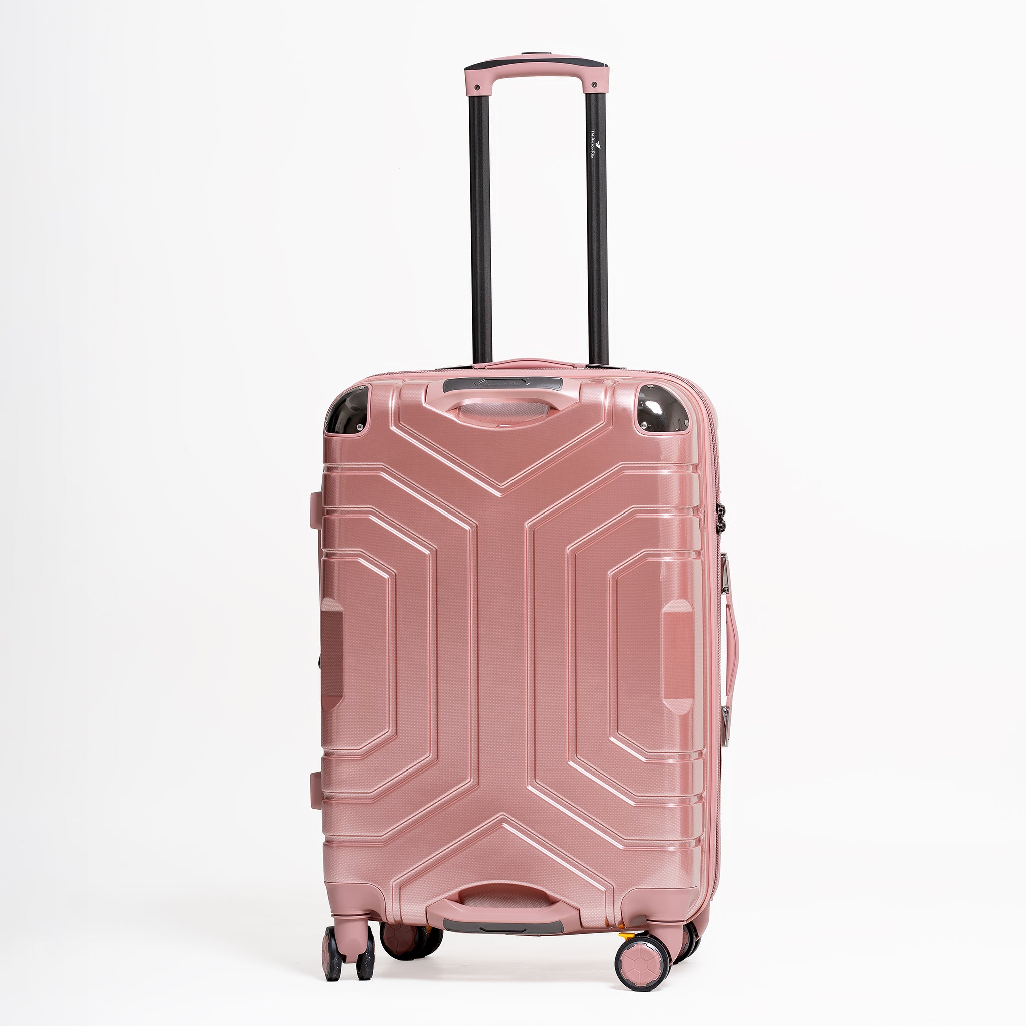 Rose gold suitcase with geometric design on a white background