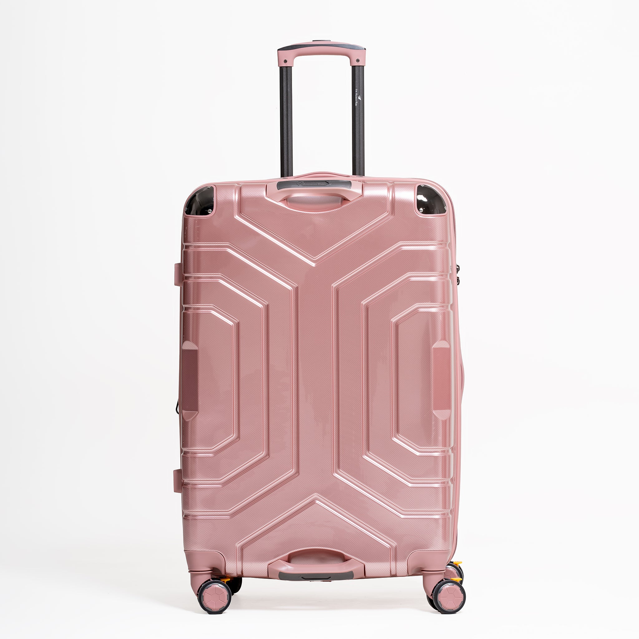 Pink suitcase with geometric design on a white background
