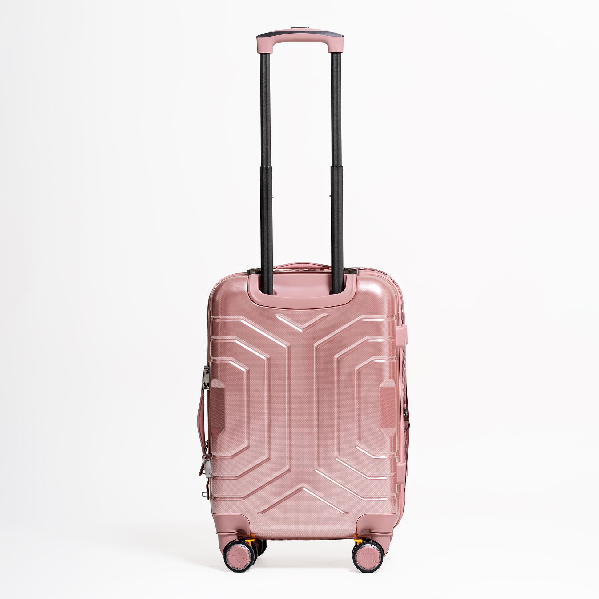 Rose gold suitcase with geometric design on a white background