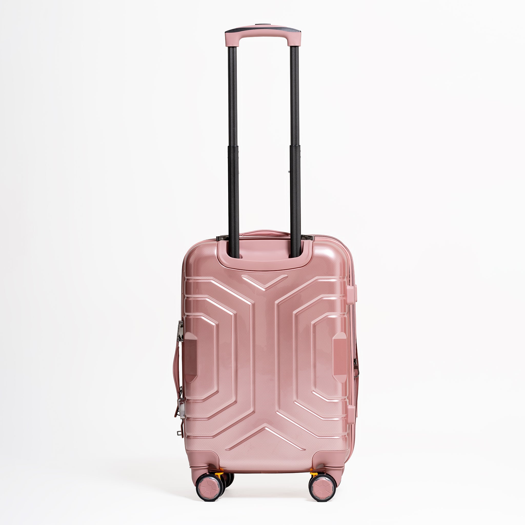 Rose gold suitcase with geometric design on a white background