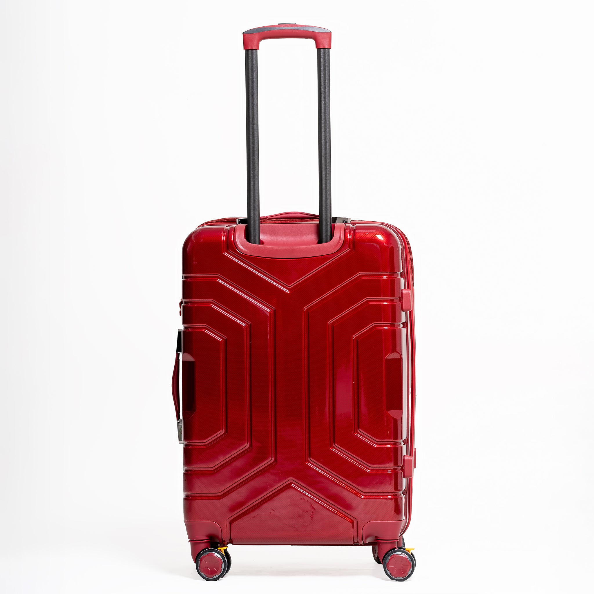 Red suitcase with geometric design on a white background