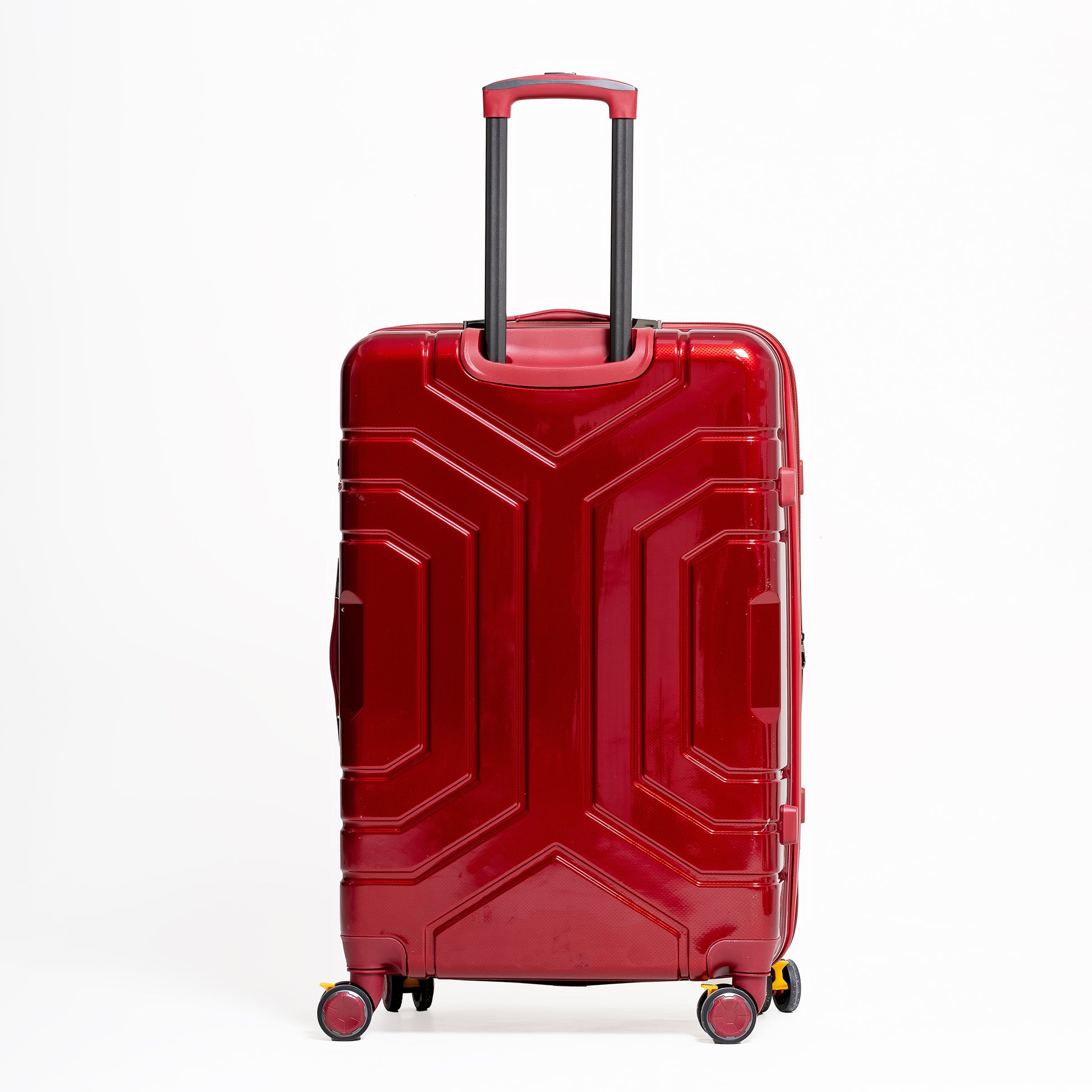 Red suitcase with a geometric design on a white background