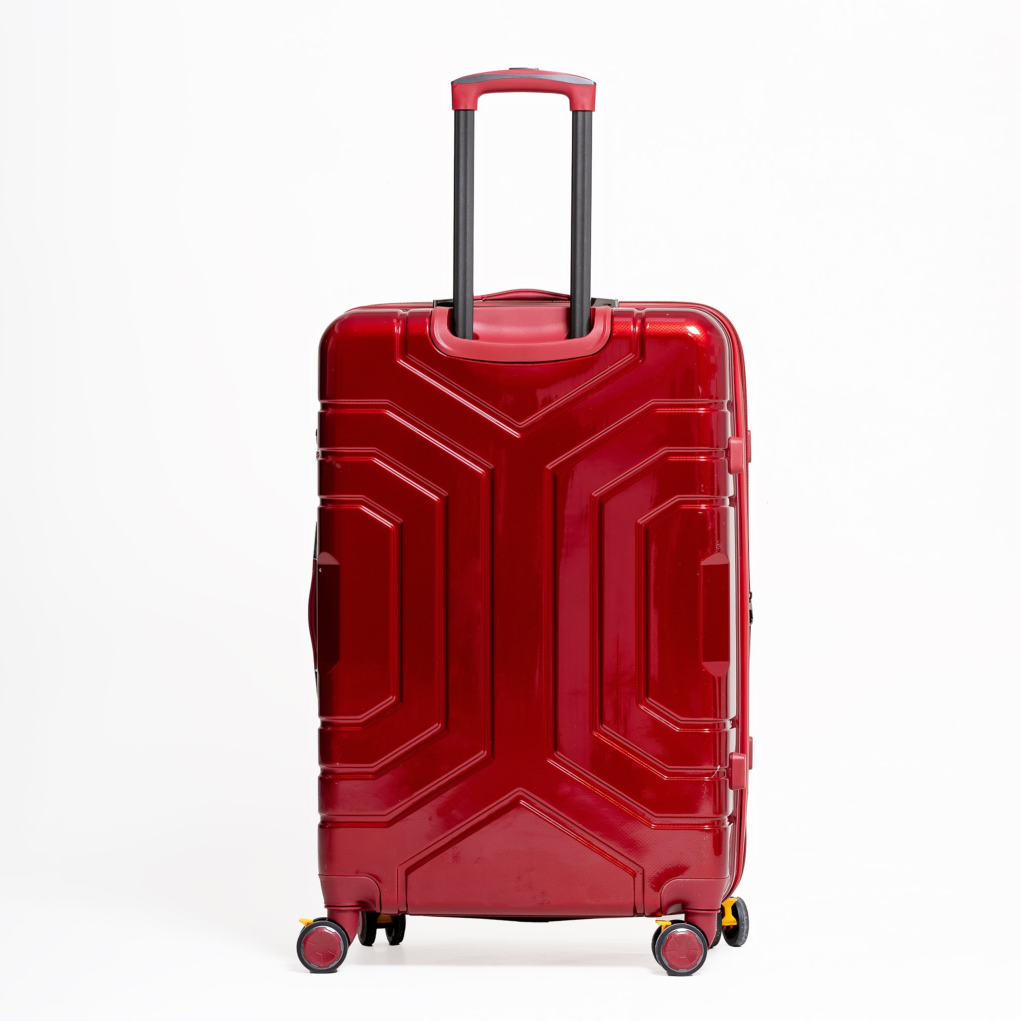 Red suitcase with a geometric design on a white background