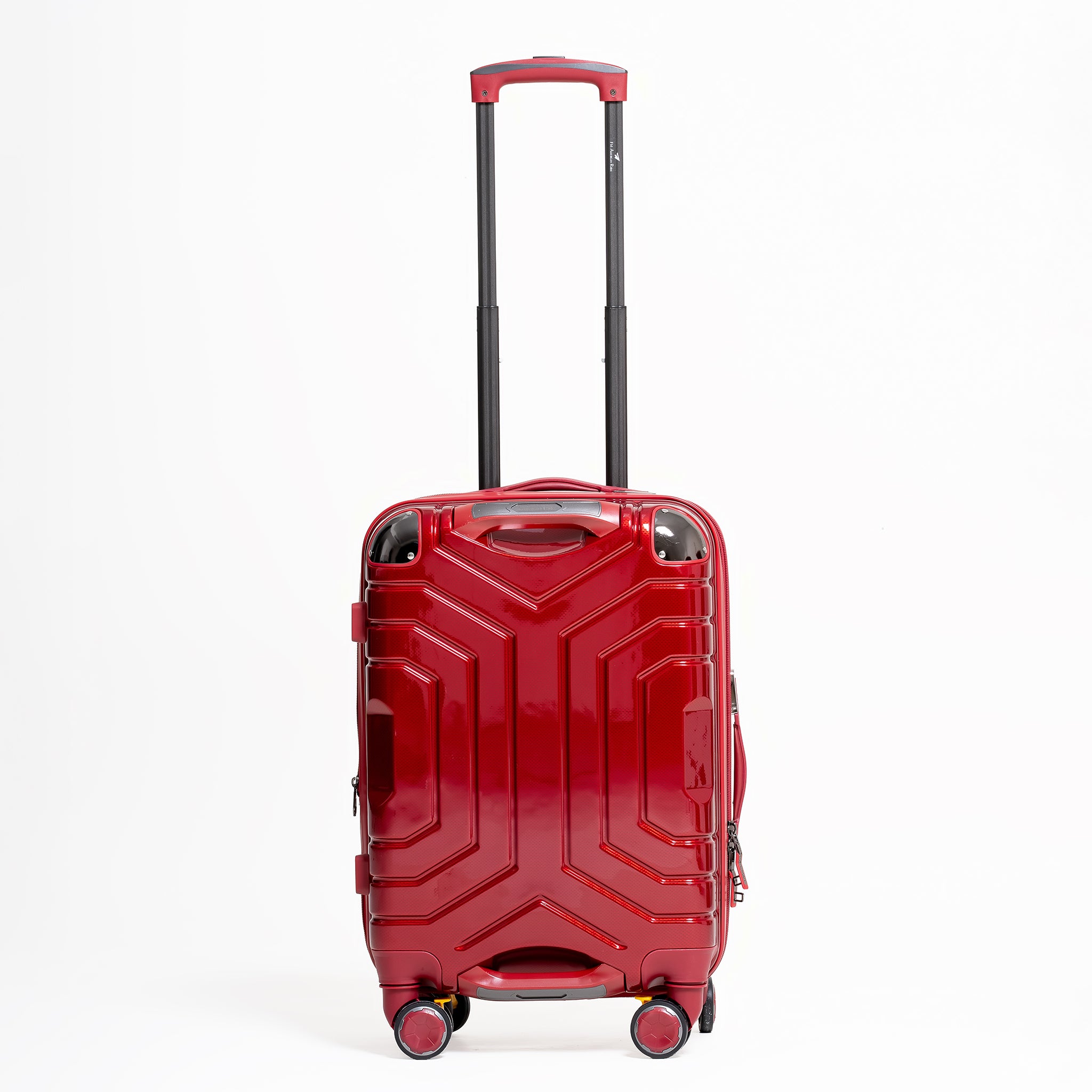 Red suitcase with a geometric design on a white background