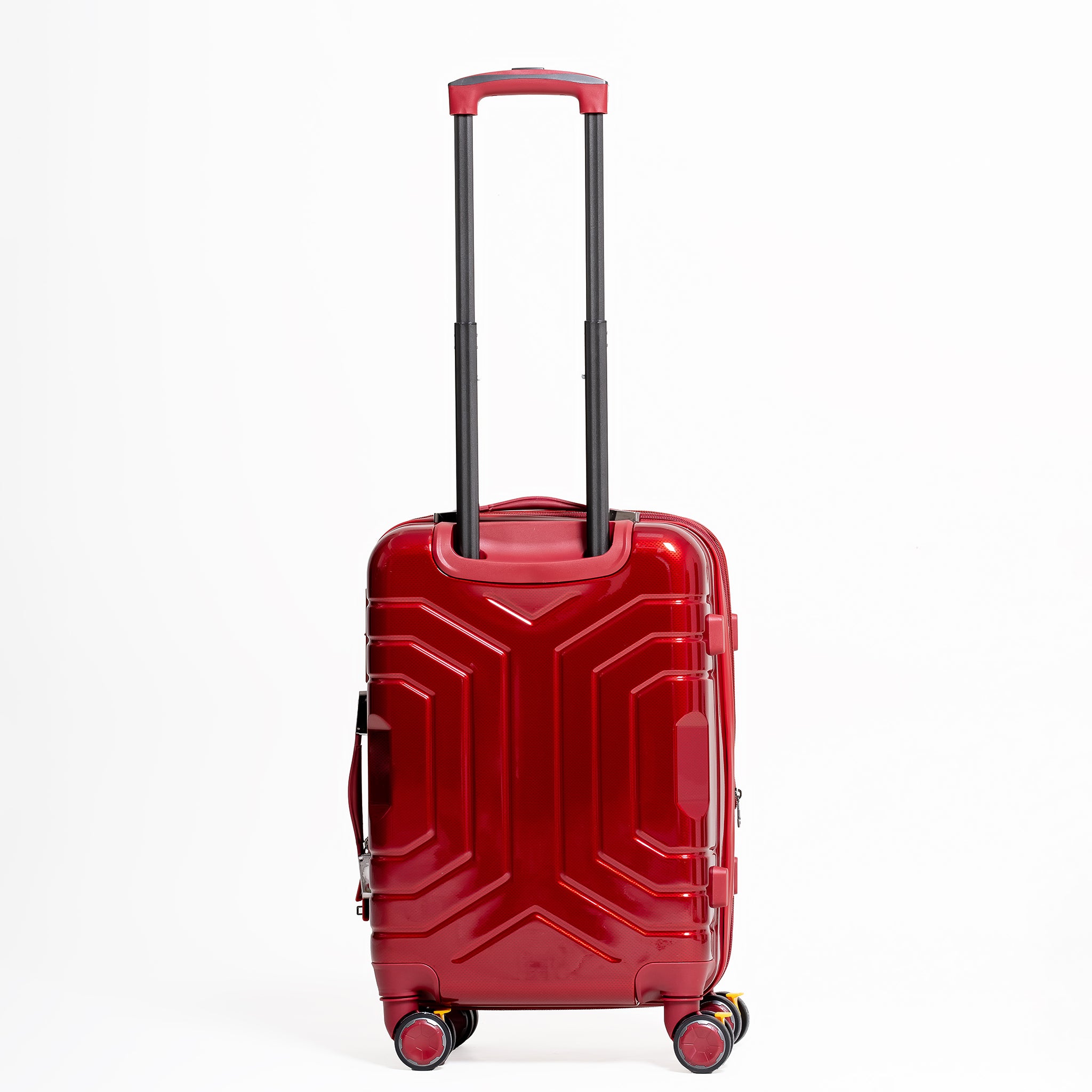 Red suitcase with a geometric design on a white background
