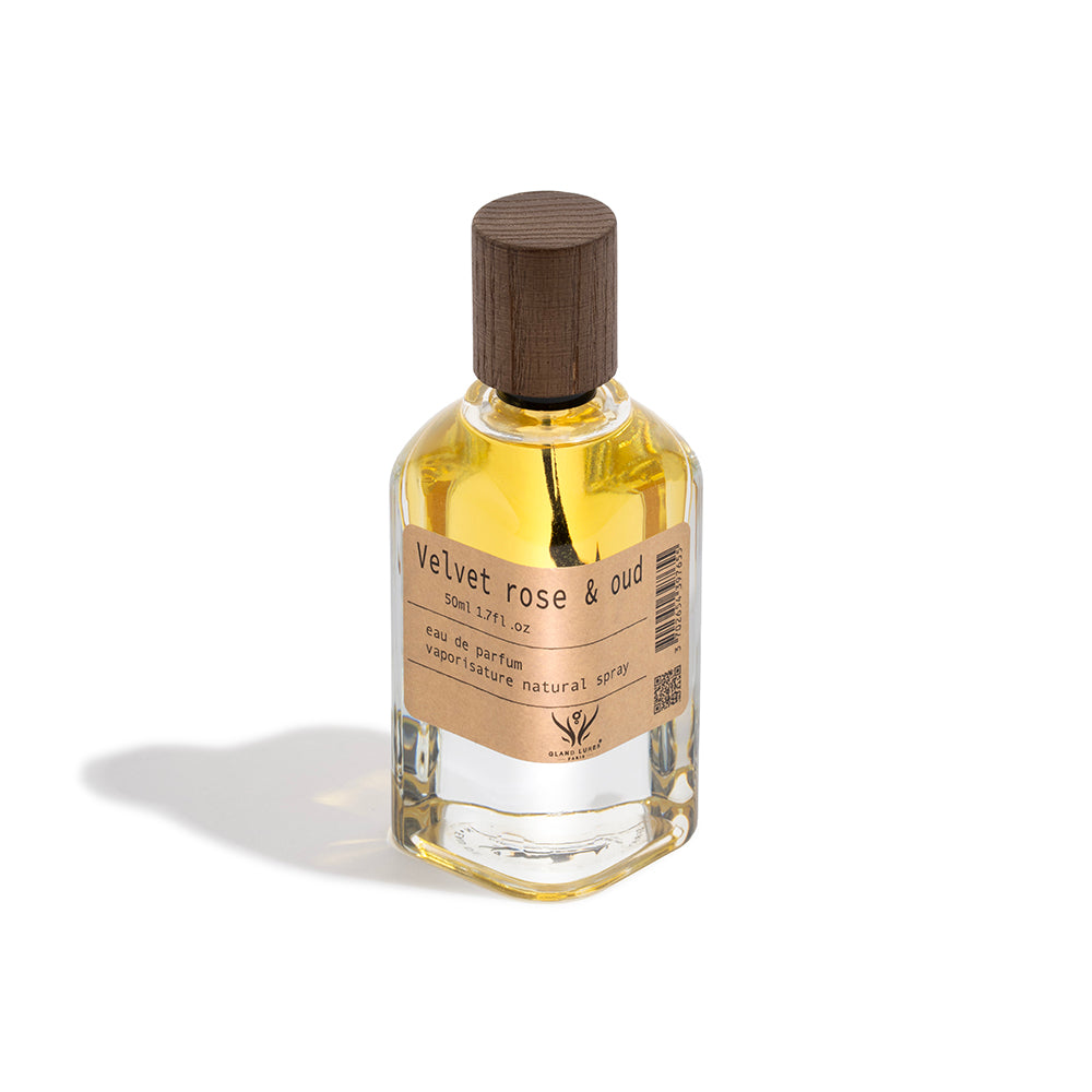 Perfume bottle labeled 'Velvet rose & oud' on a white background