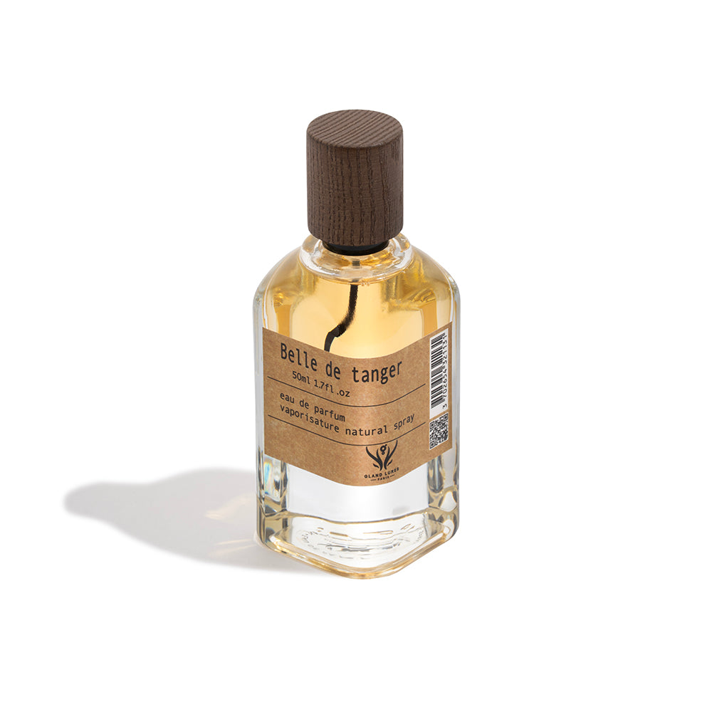 Perfume bottle labeled 'Belle de Tanger' on a white background