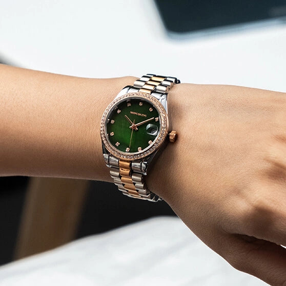 The MARKO BALENO AURORA MB202-D is a sophisticated silver and rose gold watch designed for modern women.