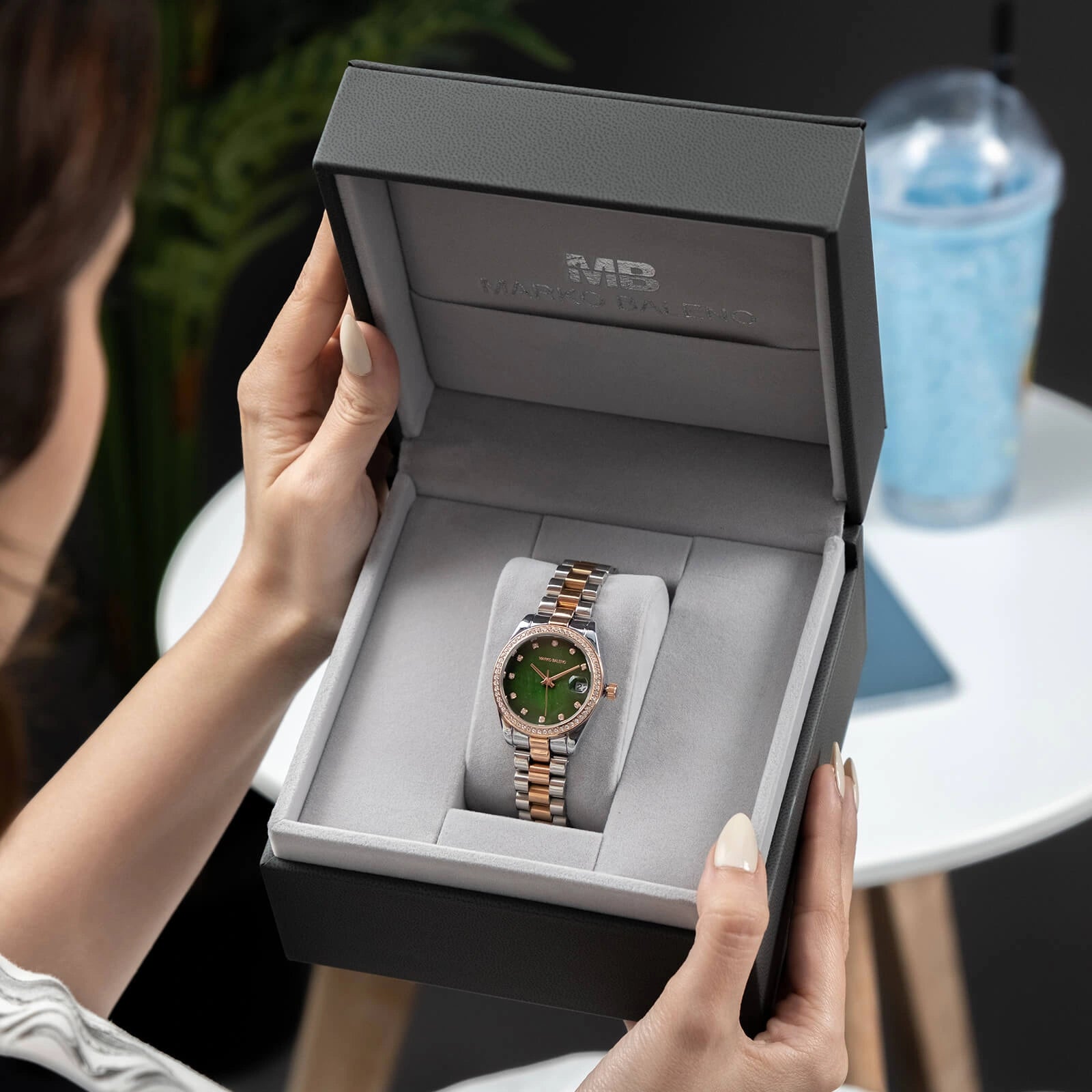 The MARKO BALENO AURORA MB202-D is a sophisticated silver and rose gold watch designed for modern women.