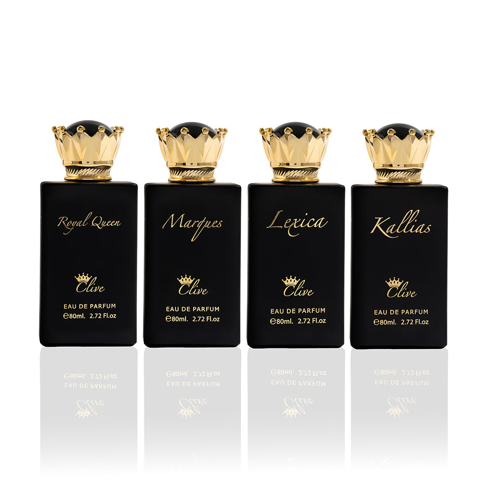Four black perfume bottles with gold crowns and labels on a white background