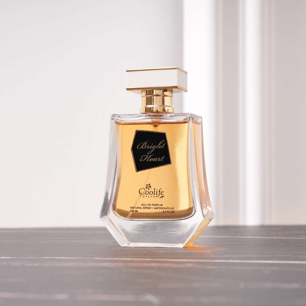 Perfume bottle labeled 'Bright Heart' by 'Coolife' on a reflective surface with a light background