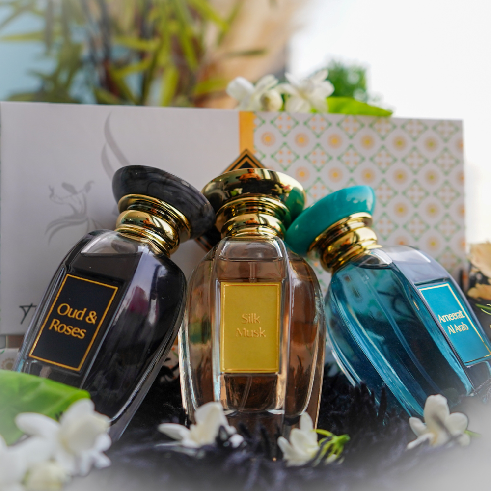 Indulge in the luxurious Ameerat Al Arab 3-Piece Perfume Set, featuring three captivating fragrances