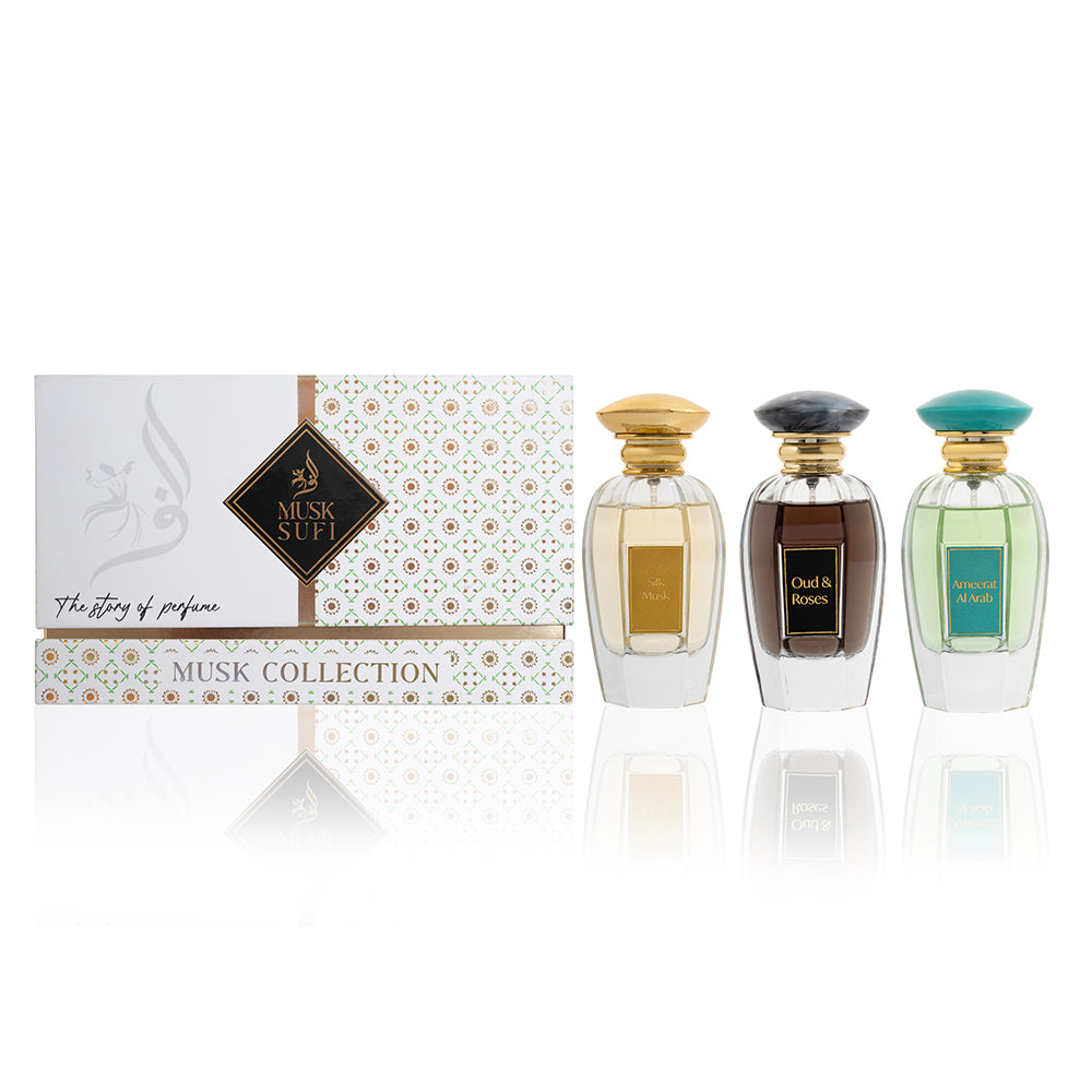 Three perfume bottles with a decorative box labeled 'Musk Sufi' on a white background.