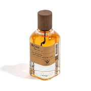 Mojave eau de parfum bottle with wooden cap on a white background