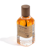 Perfume bottle labeled 'Portofino' with a wooden cap on a white background