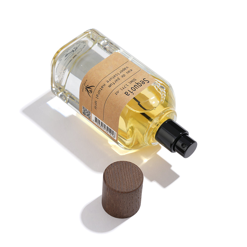 Perfume bottle with cork cap on a white background