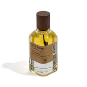 Perfume bottle with wooden cap on a white background